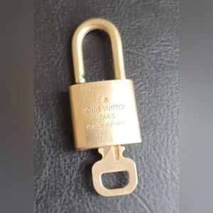 LOUIS VUITTON AUTHENTIC LOCK SET